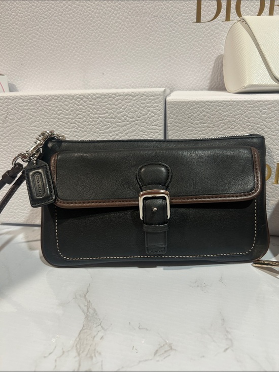 Coach Handbags - Coach Black Leather Wristlet with Brown Trim and Buckle